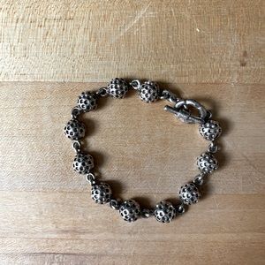 Sterling silver golf ball bracelet.
